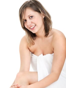 Young woman in towel with a lollipop