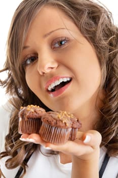 Young woman with chocolate muffin