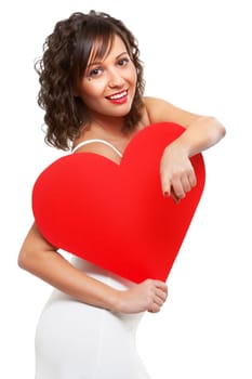 Young attractive woman holding red paper heart like a valentine card