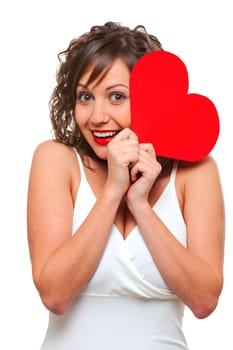 Young attractive woman holding red paper heart like a valentine card