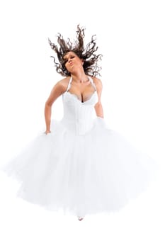 Young bride with jumping barefoot isolated on white background