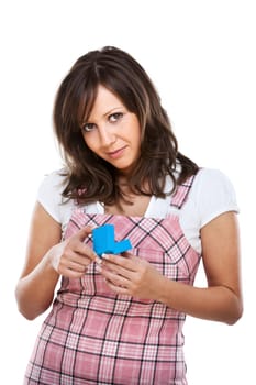 Young woman opening a small blue present, isolated on white backgrounds