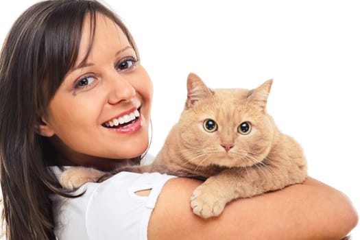 Young woman posing at camera with redhaired domestic cat