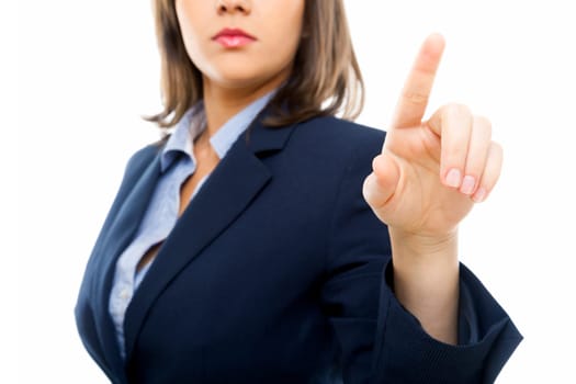 Businesswoman pointing with a finger isolated on white background