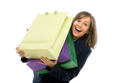 Businesswoman holding colorful presents isolated on white background