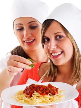Cheffs with spaghetti bolognese