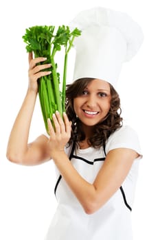 Chef woman holding celery isolated on white