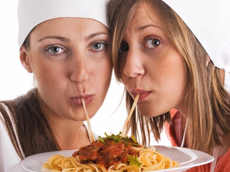 Chefs with spaghetti bolognese