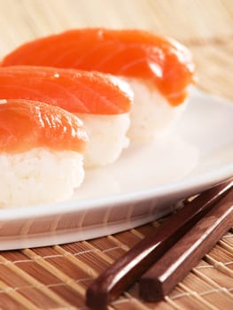 Close up of a portion Salmon nigiri sushi