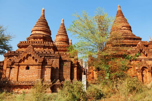 Ancient pagodas in Bagan, blue sky in background