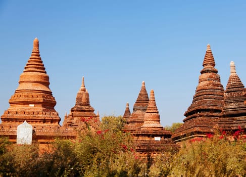 Ancient pagodas in Bagan, blue sky in background