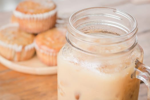 Banana muffins and iced coffee, stock photo