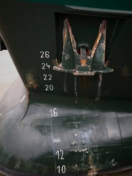 side detail view of a ship bug with an adjacent anchor