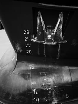 side detail view of a ship bug with an adjacent anchor