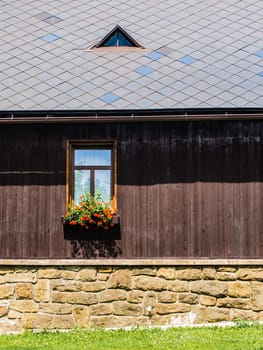 Rustic window in a mountain cottage in Bohemian Forrest, Czech republic, Europe