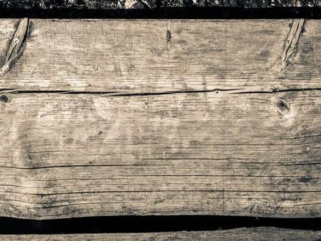 Light shady wooden background with intense texture