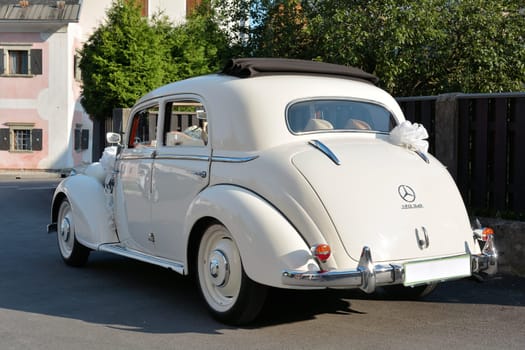 Wedding car on the side of the road in a village in Slovenia