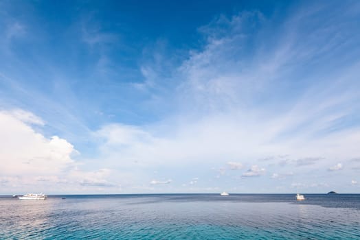 Background blue sky and cloud in summer over Andaman Sea at Honeymoon Bay in Mu Koh Similan island National Park, Phang Nga Province, Thailand