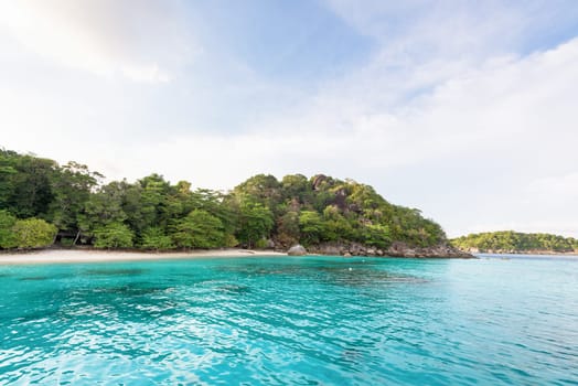Beautiful green blue sea front small beach at Honeymoon Bay is a famous attractions for diving on Ko Miang island in Mu Koh Similan National Park, Phang Nga Province, Thailand