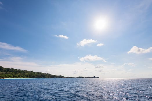 Beautiful landscape of sun on blue sky over the sea in summer at Mu Koh Similan National Park, Phang Nga Province, Thailand