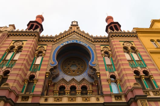 exterior of the jubilee synagogue in prague. It is the youngest and the largest synagogue in prague. Jubilee Synagogue was built in 1905-06 in Art Nouveau and pseudo moorish styles as a compensation for demolished synagogues in the Jewish Quarter.