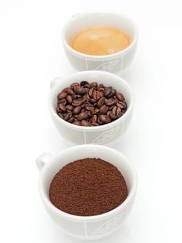 three cups of coffee,coffee beans and coffee powder