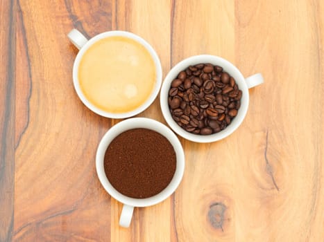 three cups of coffee,coffee beans and coffee powder