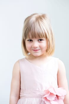 Portrait of a young girl on a white background