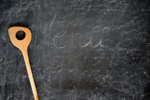 old cooking spoon background kitchen table