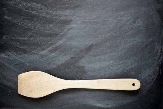 old cooking spoon background kitchen table