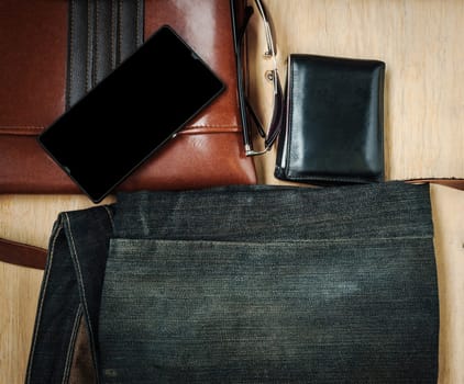 Outfit of traveler, Different objects on wooden background, Still life dark border