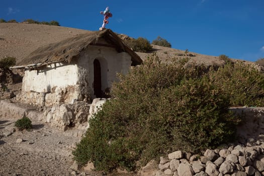 Old adobe church in the small town of Putre, which is high in the mountains of northern Chile on the edge of the altiplano.