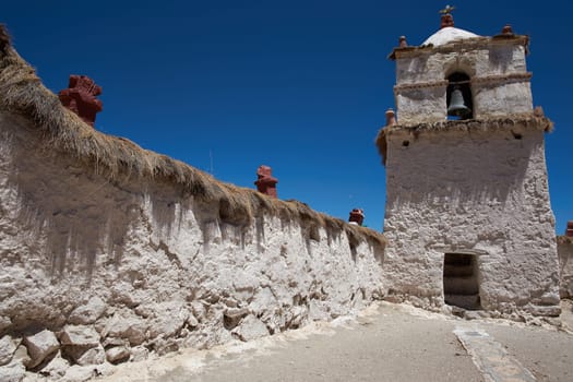 Historic 17th century church in the small village of Parinacota, located at an elevation of 4,400 metres in Lauca National Park and on the altiplano of northern Chile.
