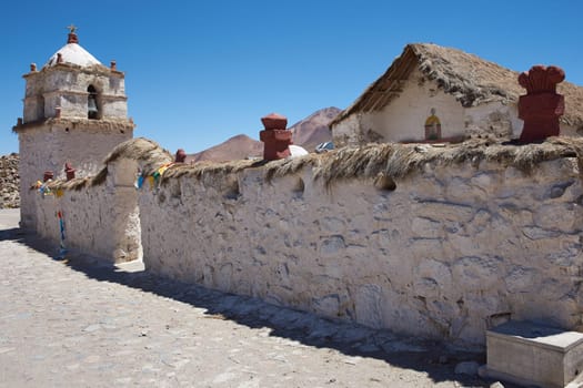 Historic 17th century church in the small village of Parinacota, located at an elevation of 4,400 metres in Lauca National Park and on the altiplano of northern Chile.
