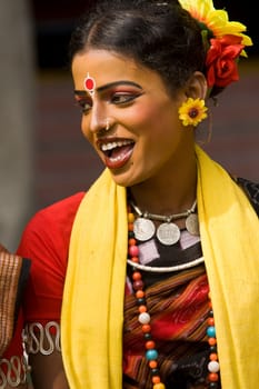 Indian dancer in traditional tribal outfit at the annual Sarujkund Craft Fair in Haryana near Delhi, India.