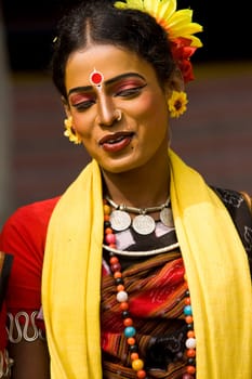 Indian dancer in traditional tribal outfit at the annual Sarujkund Craft Fair in Haryana near Delhi, India.