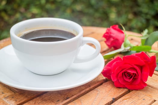 Cup of black coffee in home garden, stock photo
