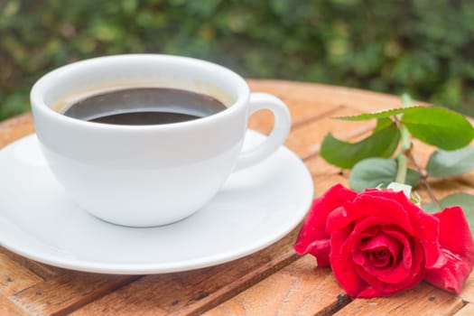 Cup of black coffee in home garden, stock photo