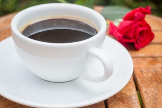 Cup of black coffee in home garden, stock photo