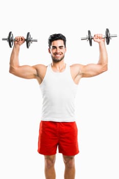 Portrait of handsome young man lifting weights, isolated on white background