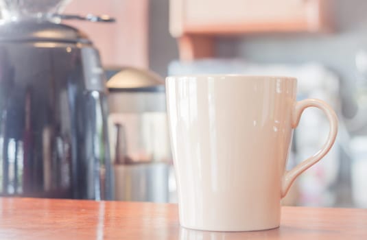 Coffee mug in coffee shop, stock photo