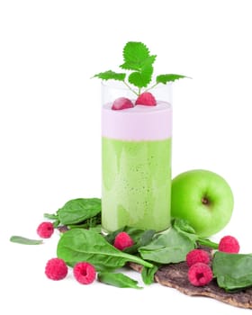 Smoothie green decorated with fruits and vegetables