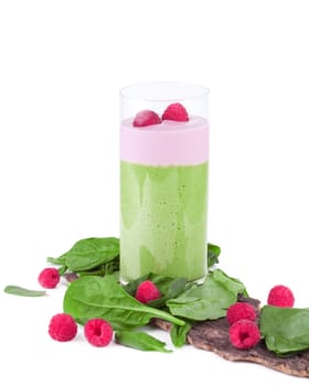 Smoothie green decorated with fruits and vegetables