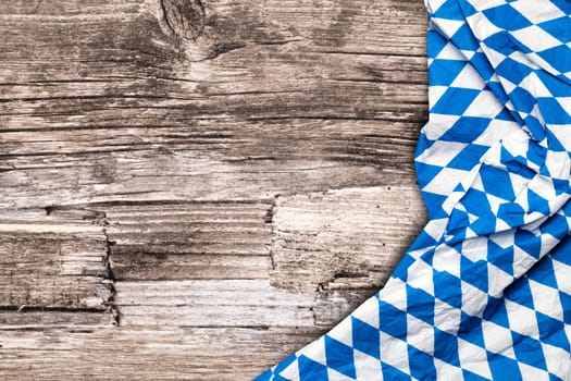 Oktoberfest tablecloth on wooden table
