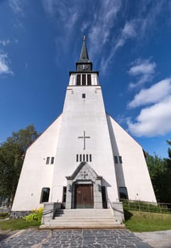 Provincial Catholic church in the north of Scandinavia. Wide-angle shot.