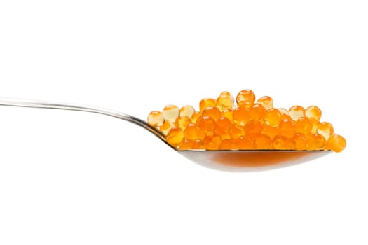 Steel spoon with red caviar. Isolate on white.