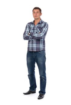 Portrait of a handsome man in a plaid shirt to his full height, isolate on white background.