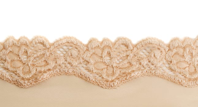 Beige cotton openwork lace. Isolate on white.