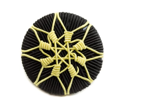 Unusual button from clothing. Isolate on white background.