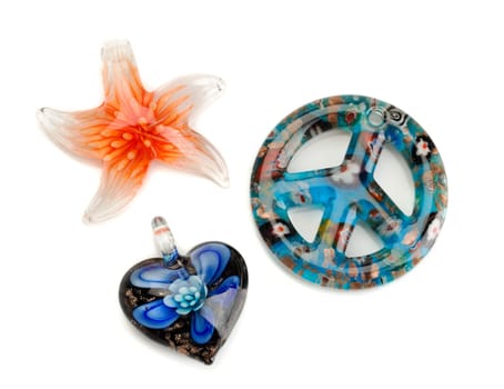 Star, heart and pacifist sign of Murano glass isolated on white background.